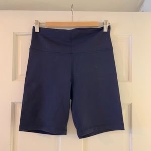 Aritzia TNA life 9in bike short. Size large, navy blue